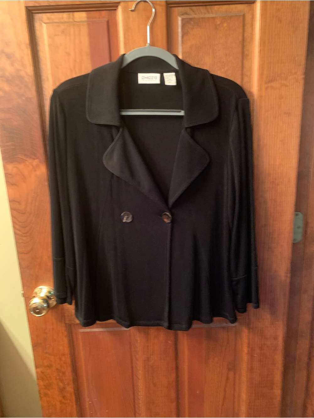 Chico Travelers, thin BLACK short jacket with wide notch collar. 2 button front.